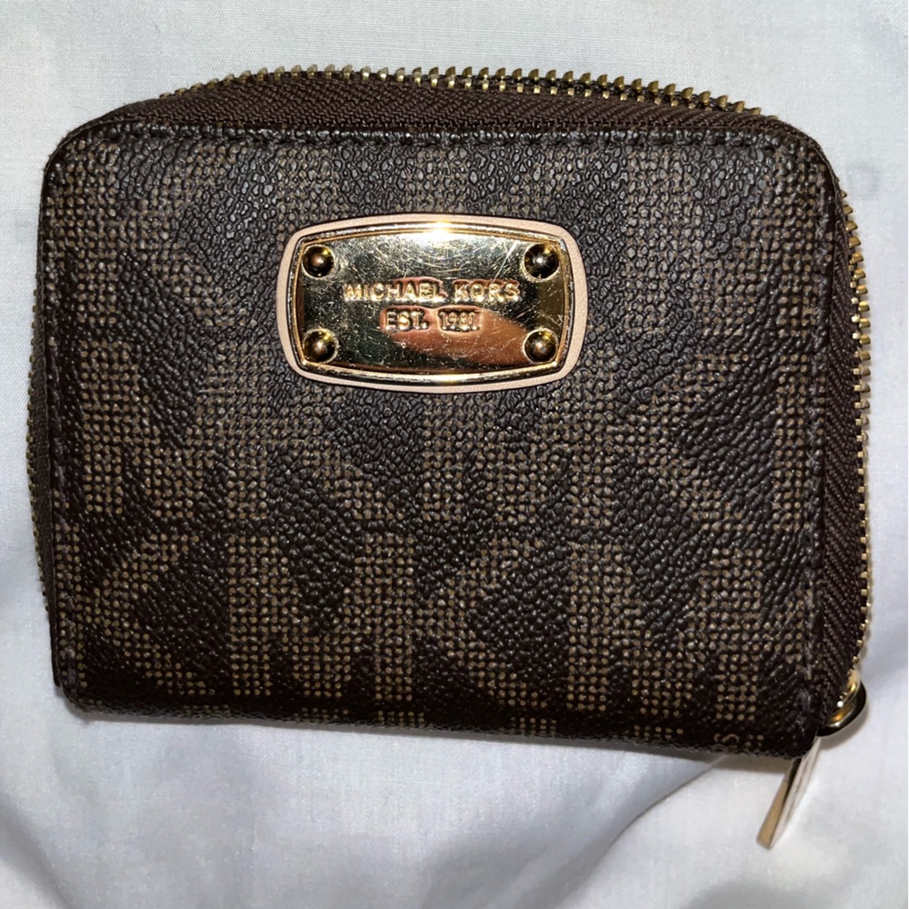 Brown monogrammed micheal kors wallet